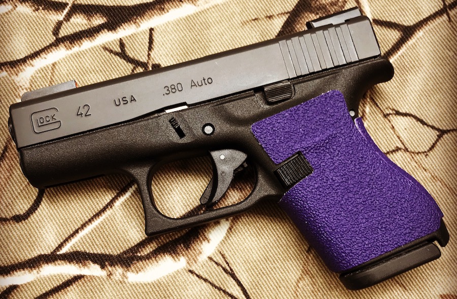Purple Tractiongrips Tenacious Series custom grip tape installed on a Glock 42